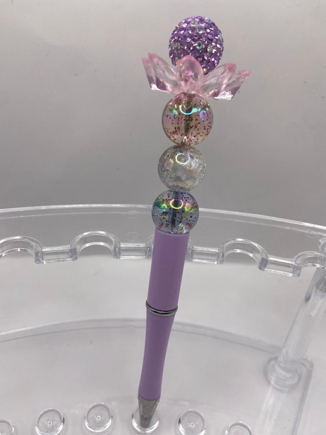 Beaded pen with flower design