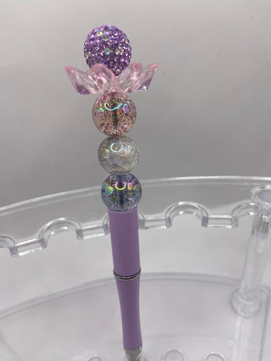 Beaded pen with flower design